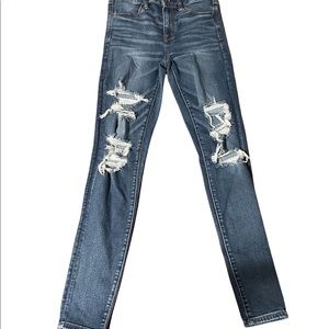 Dark wash American Eagle jeans with rips